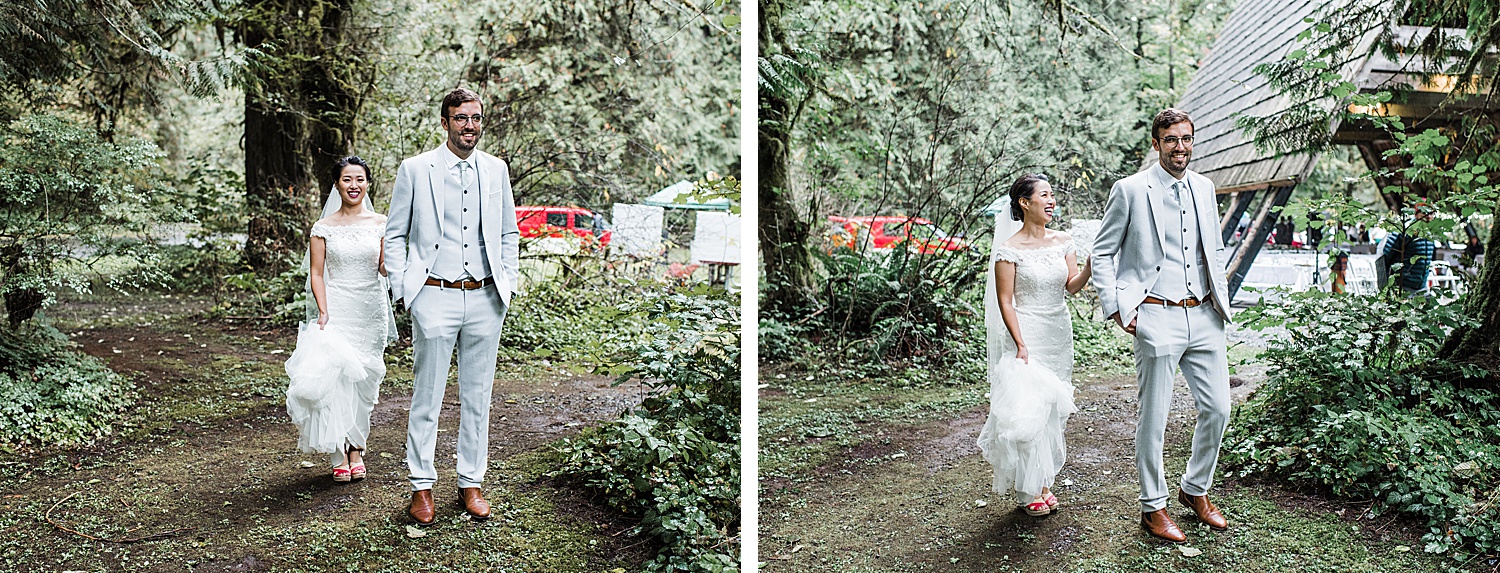 bride and groom are doing their first look behind the venue in the woods